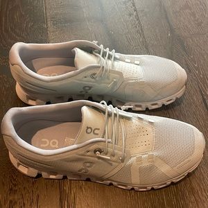 On cloud a white womens 10 brand new worn one time for a few hours but too big.